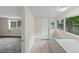 Mud room area with tile floors, windows and a door to the outside at 4232 S Grant St, Englewood, CO 80113