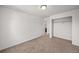 Spacious bedroom with neutral carpet and large closet, providing ample storage at 15602 E 117Th Ave, Commerce City, CO 80022