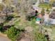 Expansive backyard with garden, shed, mature trees, and lush green lawn at 1542 Kilkenny, Boulder, CO 80303