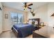 Serene bedroom with a comfortable bed, a deer head decoration, and a cozy ambiance at 3361 Mariposa St, Denver, CO 80211