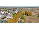 Aerial view of homes, park and community center at 889 Crest St, Lochbuie, CO 80603