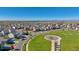 Aerial view of a new community with parks and playgrounds at 889 Crest St, Lochbuie, CO 80603