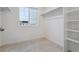 Spacious walk-in closet with shelving and hanging rods at 889 Crest St, Lochbuie, CO 80603