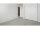 Neutral bedroom featuring carpet floor and a double door closet at 14536 Mellow Ct, Morrison, CO 80465