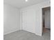 Cozy bedroom featuring a double sliding-door closet, neutral carpet, and ample natural light at 14536 Mellow Ct, Morrison, CO 80465