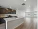 Kitchen with stainless appliances, stone countertops, and an open floorplan at 14536 Mellow Ct, Morrison, CO 80465
