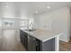 Kitchen with island, stainless appliances, and an open floorplan at 14536 Mellow Ct, Morrison, CO 80465