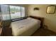 Cozy bedroom with a large window offering plenty of natural light at 9798 Grove St, Westminster, CO 80031