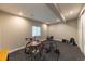 Unfinished basement space with rubber floor, a window, and plenty of room for storage at 6759 Canyonpoint Rd, Castle Pines, CO 80108