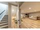 Finished basement with a spacious living area, stairs, and play area, great for Gathering fun at 6759 Canyonpoint Rd, Castle Pines, CO 80108