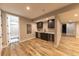 Enjoy this finished basement's beautiful wet bar complete with a wine fridge and dishwasher at 6759 Canyonpoint Rd, Castle Pines, CO 80108
