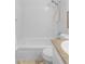 Bright shower features a showerhead and white tiled walls for a clean and fresh look at 8787 Yukon St, Arvada, CO 80005