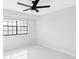 Bright bedroom features a ceiling fan, and a large window that provides great natural light at 8787 Yukon St, Arvada, CO 80005