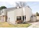 Charming townhome exterior with well-kept lawn, neutral siding, and a private entrance at 8787 Yukon St, Arvada, CO 80005