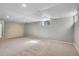 Unfinished basement with neutral carpet flooring, recessed lighting, and room for activities at 4781 S Grant St, Englewood, CO 80113