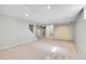 Spacious unfinished basement with carpet flooring, recessed lighting, and staircase access at 4781 S Grant St, Englewood, CO 80113