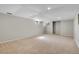 Spacious unfinished basement with neutral carpet flooring and bright recessed lighting at 4781 S Grant St, Englewood, CO 80113