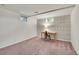 Finished basement featuring carpet flooring and accent wall at 4781 S Grant St, Englewood, CO 80113