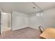 Cozy bedroom featuring neutral carpet, natural light, and closet entrance at 4781 S Grant St, Englewood, CO 80113