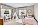 ' bedroom with cozy teepee, twin bed, and light-filled windows for natural lighting at 4781 S Grant St, Englewood, CO 80113
