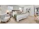 Serene main bedroom with neutral tones, plush carpet, and stylish furnishings at 4781 S Grant St, Englewood, CO 80113