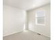 Bright bedroom with neutral walls and carpet at 1927 S Coolidge Way, Aurora, CO 80018