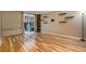 Hardwood floor living room with sliding door to patio at 830 N Sherman St # 106, Denver, CO 80203