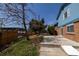 A view of the backyard with grass and patio at 6720 W 112Th Pl, Westminster, CO 80020