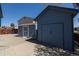Backyard showing two storage sheds with concrete foundation at 6720 W 112Th Pl, Westminster, CO 80020