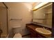 A bathroom with a shower stall, toilet, and a single sink in a vanity at 6720 W 112Th Pl, Westminster, CO 80020
