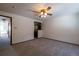 Bedroom featuring carpeting, a ceiling fan, and a small wet bar at 6720 W 112Th Pl, Westminster, CO 80020