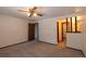 Bedroom featuring carpeting, a ceiling fan, and two closets at 6720 W 112Th Pl, Westminster, CO 80020