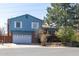 Charming two-story home featuring a brick facade and a well-manicured front yard on a sunny day at 6720 W 112Th Pl, Westminster, CO 80020