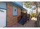 Charming home featuring a covered front porch with steps and brick accents at 6720 W 112Th Pl, Westminster, CO 80020