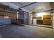 Spacious garage with built in shelving and cabinets and ramp at 6720 W 112Th Pl, Westminster, CO 80020