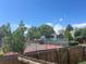 Well maintained community basketball court with trees and lush landscaping at 8771 Carr Loop, Arvada, CO 80005
