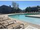 Relaxing community pool featuring lounge chairs for residents to enjoy a refreshing swim at 8771 Carr Loop, Arvada, CO 80005