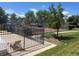 Community tennis courts perfect for exercise and socializing with neighbors and friends at 8771 Carr Loop, Arvada, CO 80005