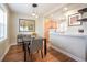 Modern dining area flows seamlessly into the kitchen, perfect for entertaining at 2813 Jasmine St, Denver, CO 80207