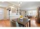 Stylish dining area with an open layout connecting to the living room and kitchen at 2813 Jasmine St, Denver, CO 80207