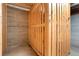 Storage unit in the basement with wood paneling and a latch at 2813 Jasmine St, Denver, CO 80207