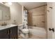 Updated bathroom with vanity, toilet, and bathtub/shower combo at 117 Sandler Dr, Lafayette, CO 80026