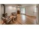 Inviting living room featuring hardwood floors, a cozy fireplace, and neutral decor at 117 Sandler Dr, Lafayette, CO 80026