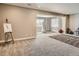 Spacious basement area featuring neutral carpet, recessed lighting, and separate exercise area at 11096 Endeavor Dr, Parker, CO 80134