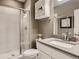 Modern bathroom with a glass-enclosed shower, sleek vanity, and contemporary fixtures for a spa-like experience at 11096 Endeavor Dr, Parker, CO 80134