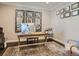 Home office featuring a wood desk, decorative mirrors, and a comfortable chair at 11096 Endeavor Dr, Parker, CO 80134