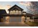 Charming two-story home with stone accents and a well-maintained front yard at 8783 S Carr Way, Littleton, CO 80128