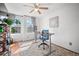 Bright office space with natural light, desk, chair, and stylish decor at 8783 S Carr Way, Littleton, CO 80128