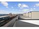 A rooftop with views overlooking the city skyline, demonstrating the amazing scenery from the property at 2620 S Delaware St # 3, Denver, CO 80223