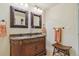 Bathroom features a marble countertop, double sinks, and elegant accents for a luxurious feel at 4619 Mohawk Dr, Larkspur, CO 80118